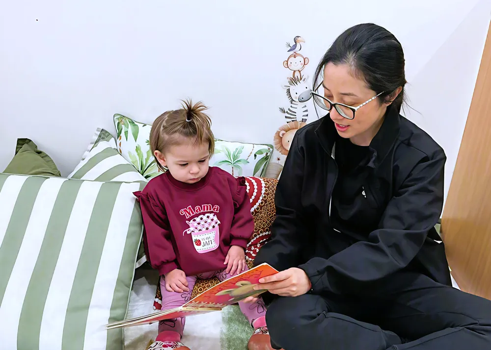 Bilingual books and materials in a Little Jungle Early Learning room, Dundas
